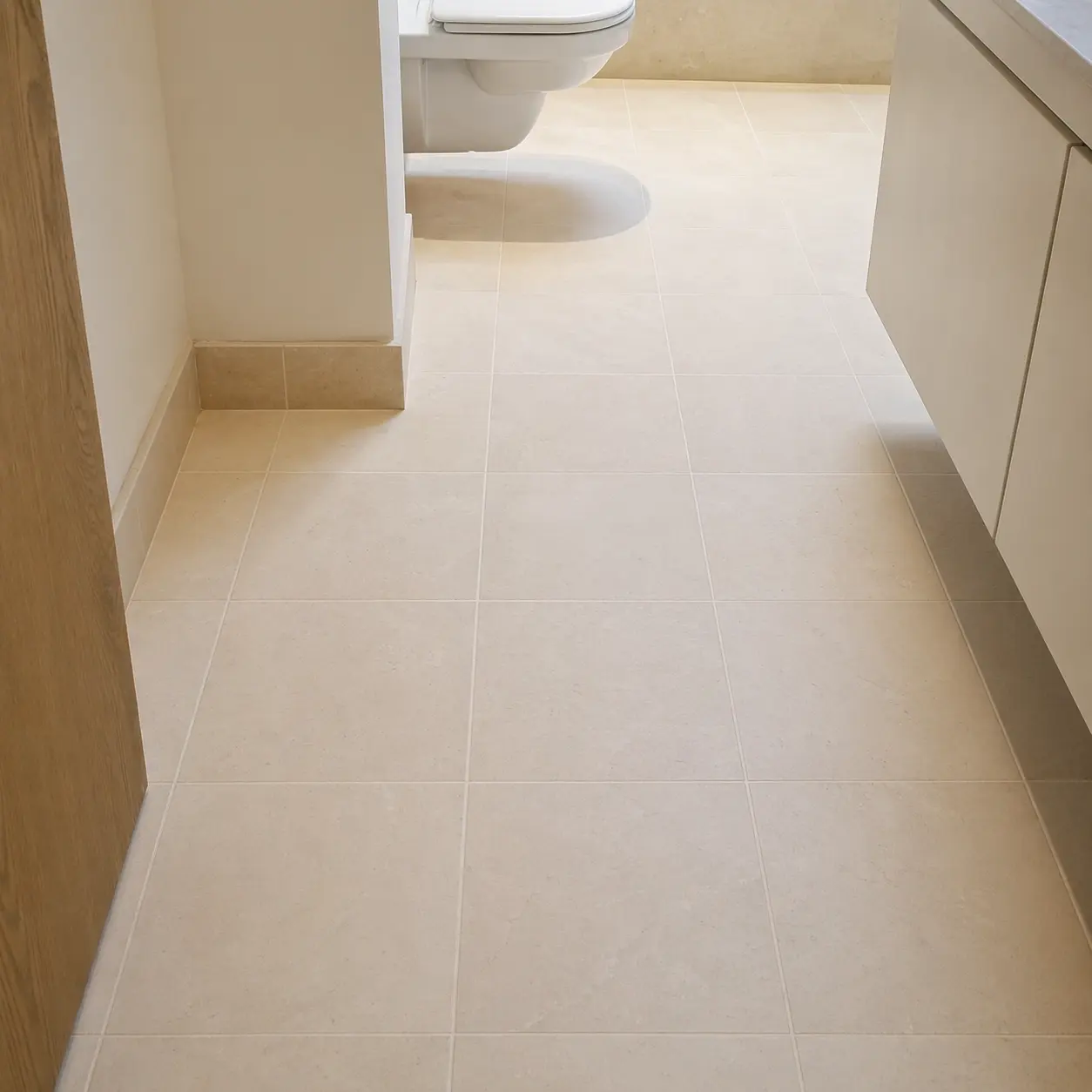 Restored limestone bathroom floor, honed and resealed